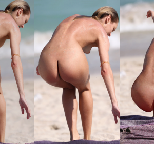 Candice Swanepoel completely nude on the beach sitting down