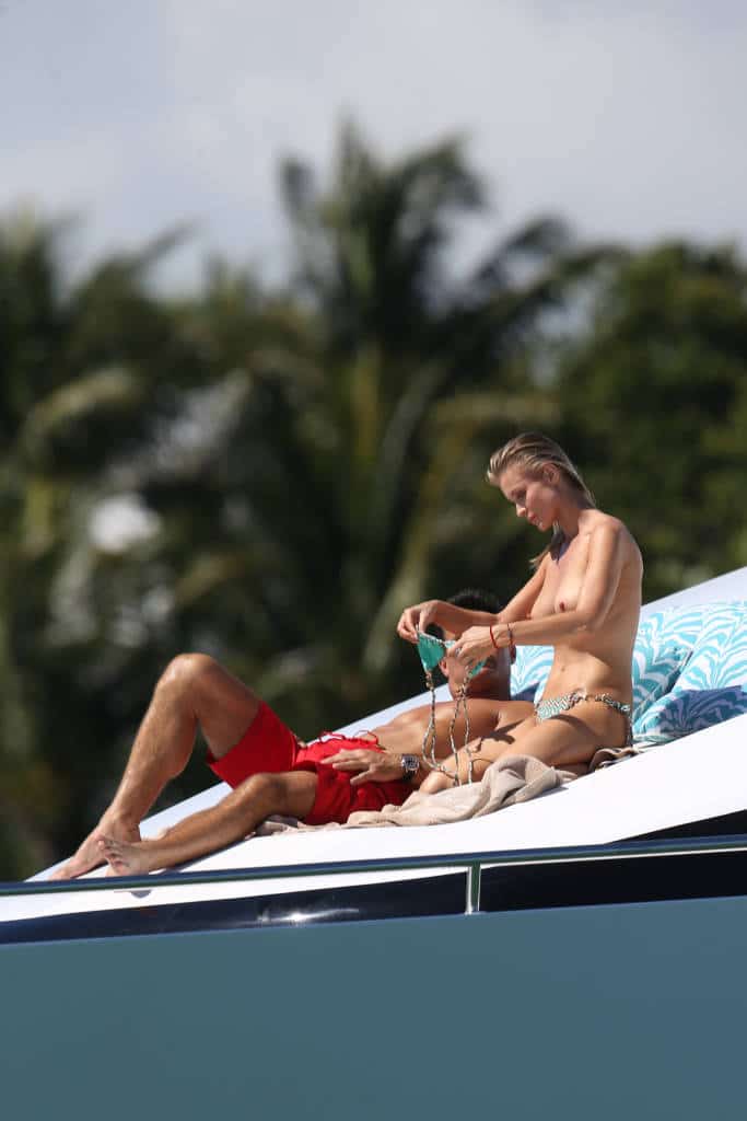 Joanna Krupa topless on a yacht with boyfriend