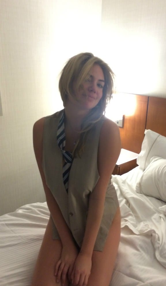 Kate Upton leaked pic on bed with tie around her neck looking seductive