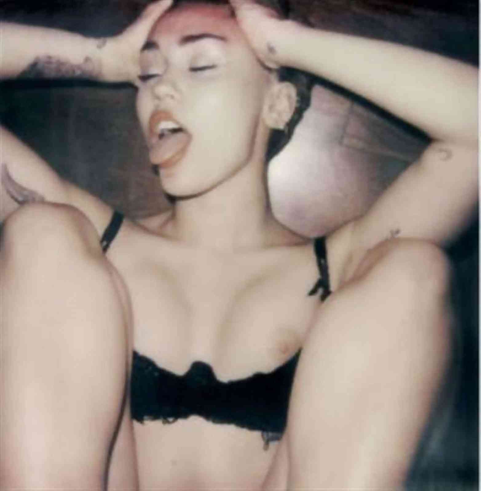 Miley Cyrus topless getting ready for cumshot