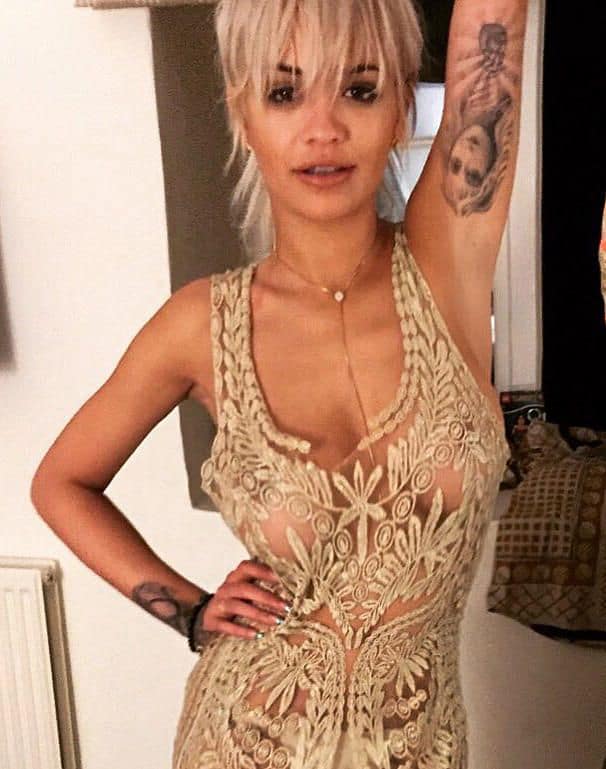 sexy rita ora and her see through top showing her nipples