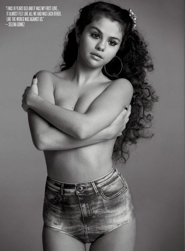 completely topless with arms around her boobs selena gomez