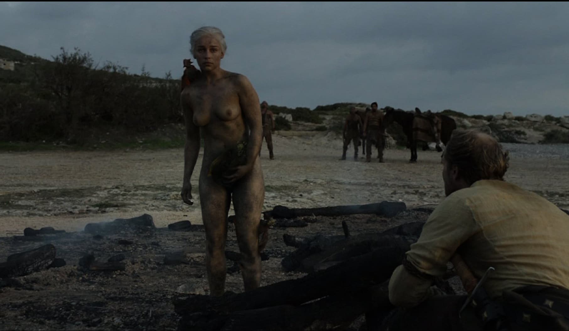completely naked emilia clarke with mud all over her