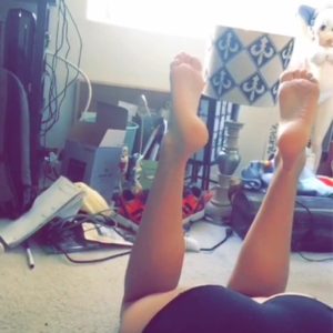 hot pic of jessica nigri's boot and feet in the air