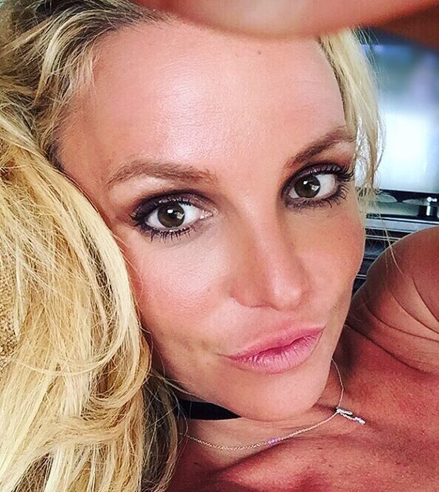 Britney Spears taking a close up selfie with some duck lips