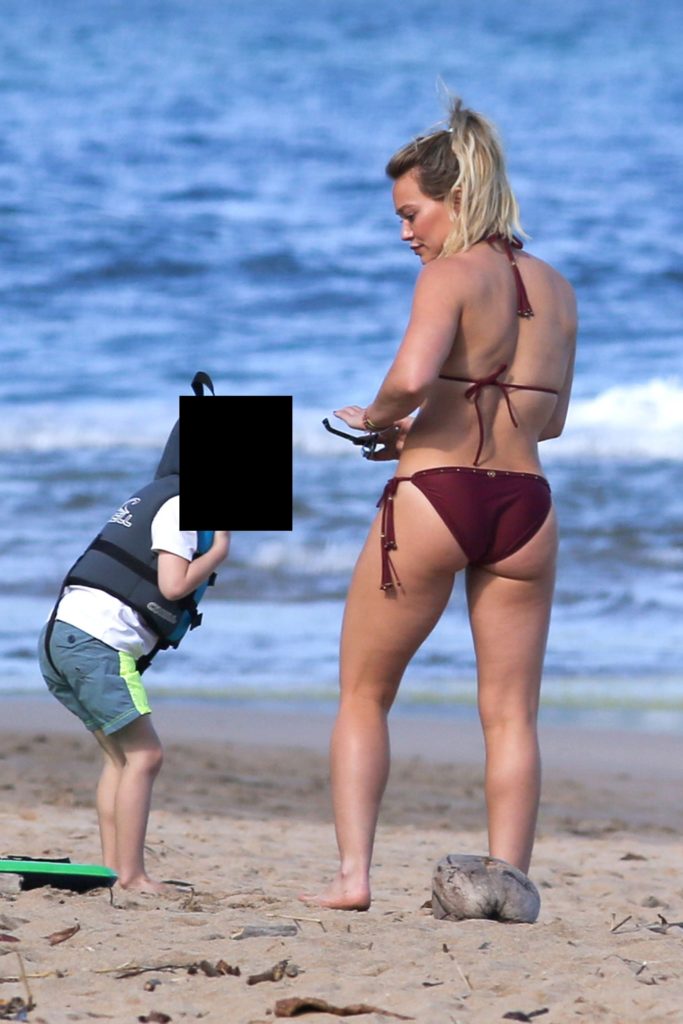 Hilary Duff in a maroon bikini showing her amazing ass